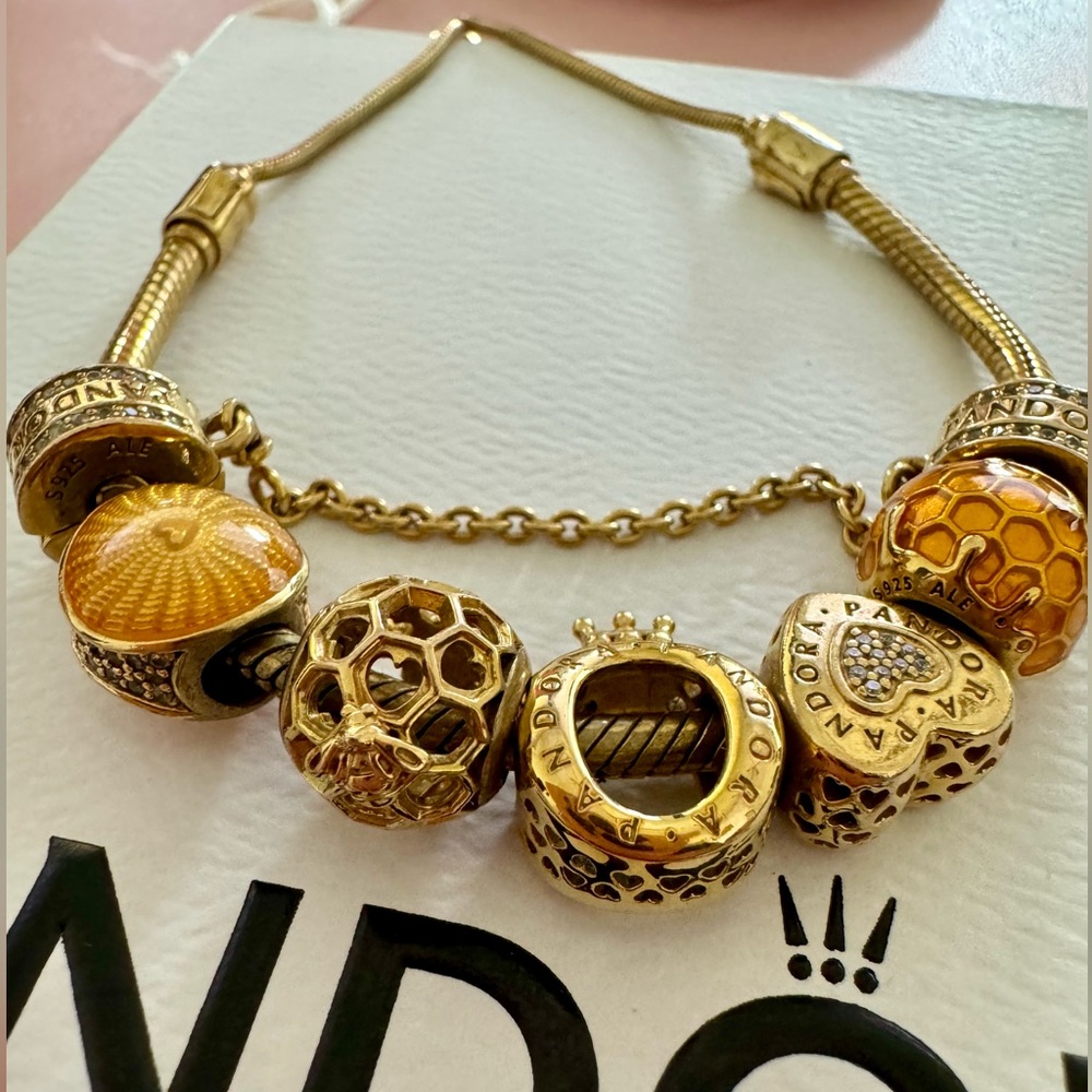 Authentic Pandora Gold Bracelet with 5 charms and safety chain